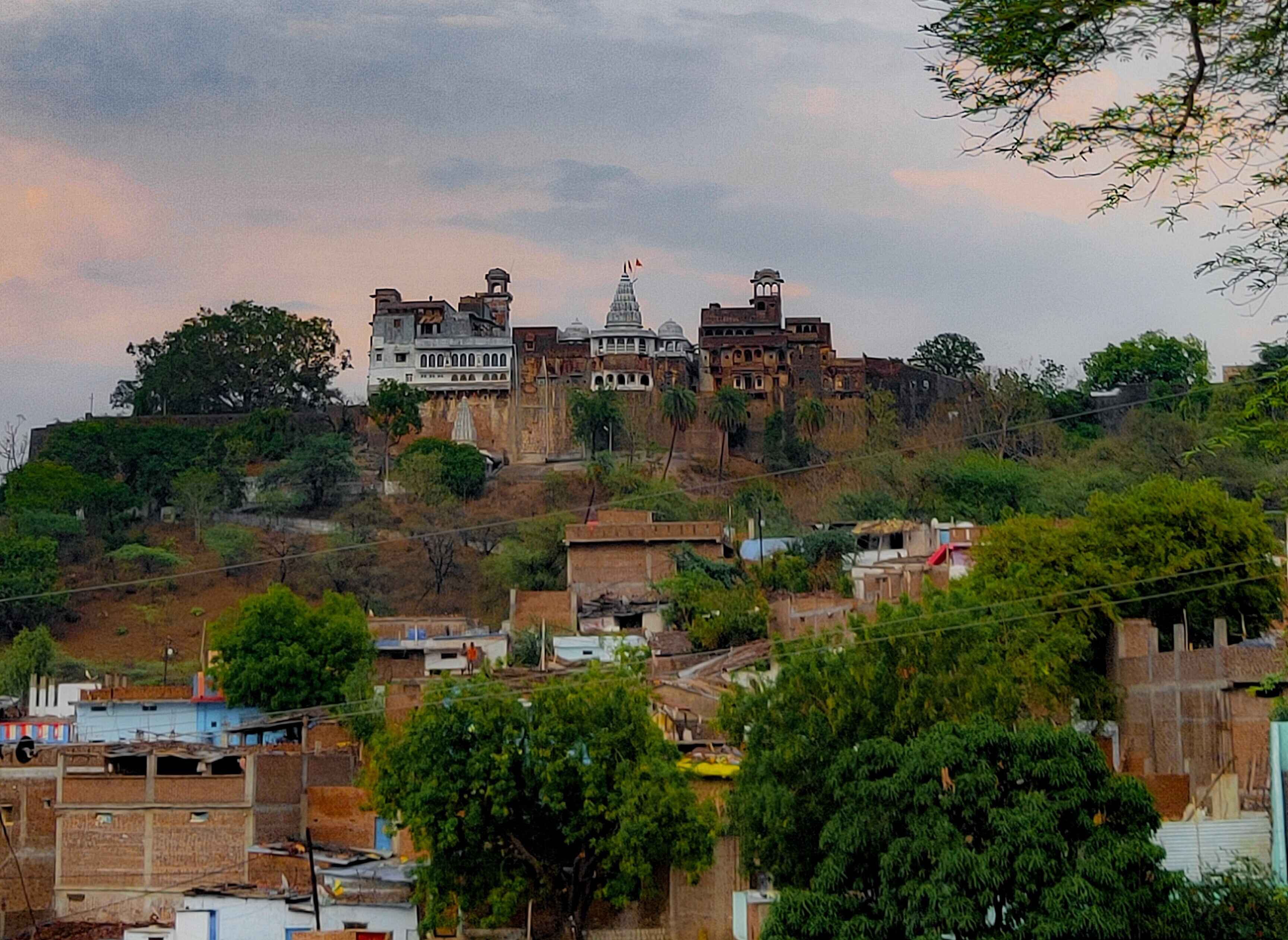 Mali Mandir temple on a hill overlooking the town and its semi-pucca housing.