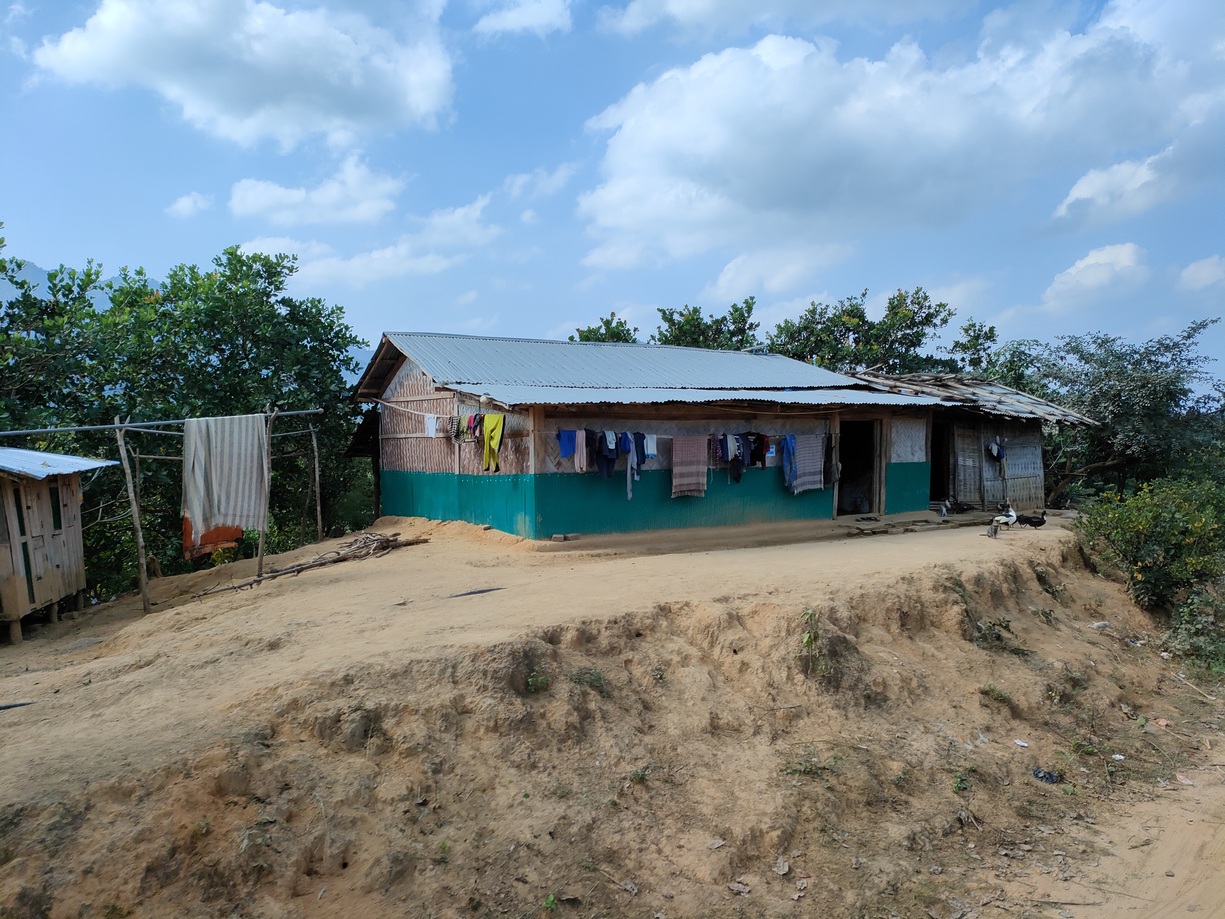 Vulnerable shanty settlements, isolated on unstable terrain near the Sangu River.